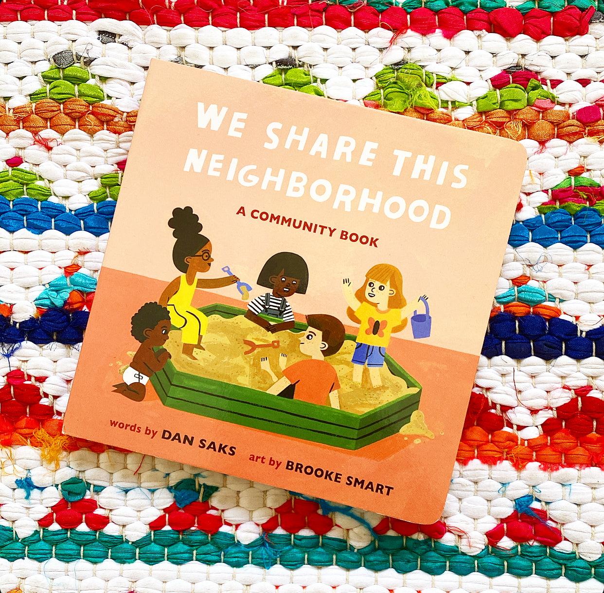 We Share This Neighborhood: A Community Book | Dan Saks (Author) + Brooke Smart (Illustrator)